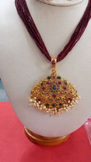 1.Maroon colored bead Necklace with Locket